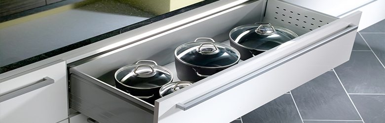 saucepans in kitchen drawer